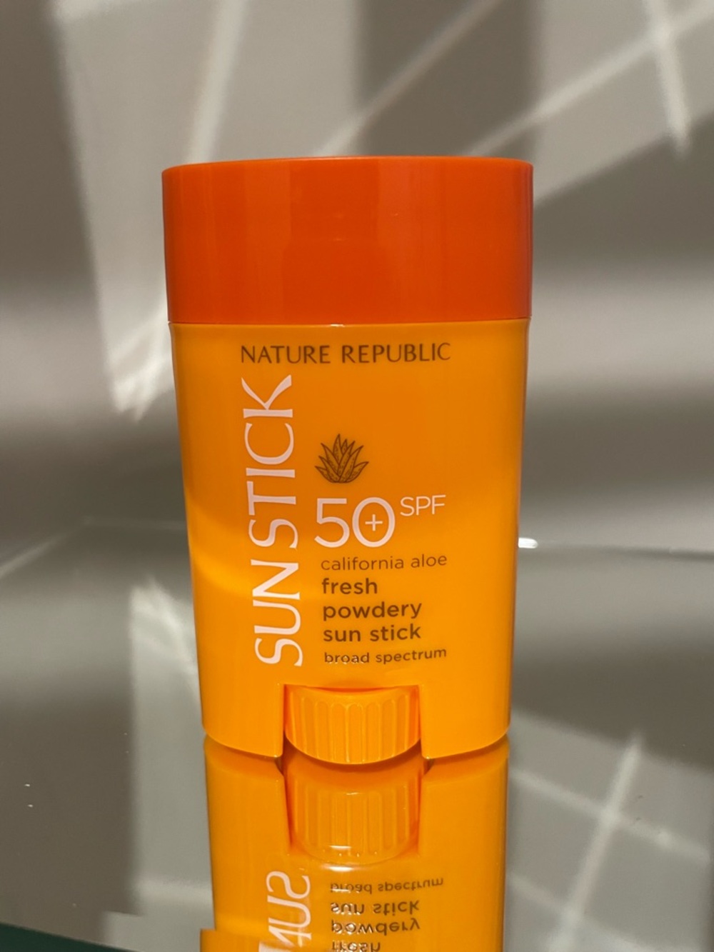 SPF 50+ Orange Sun Stick - Fresh Powdery Aloe Nature Republic